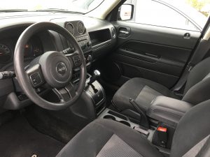 Grey Jeep Front Drivers